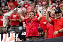 UNLV fans cheer during the college football game against Fresno State at Allegiant Stadium, Sat ...