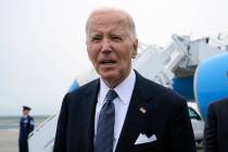 President Joe Biden speaks the the media after stepping off Air Force One at Dover Air Force Ba ...