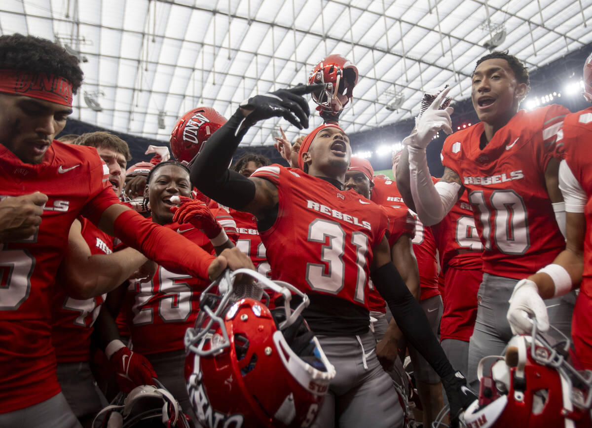 UNLV defensive back Jalen Baldwin (31) dances with his teammates after defeating Fresno State 5 ...