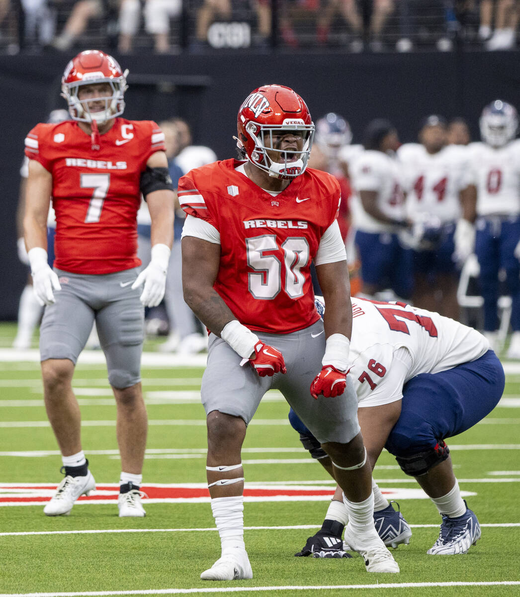 UNLV defensive lineman Jalen Dixon (50) celebrates after a play during the college football gam ...