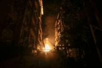 A fire burns at the site of an Israeli airstrike in Beirut's southern suburbs Friday, Sept. 27, ...