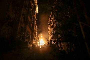 A fire burns at the site of an Israeli airstrike in Beirut's southern suburbs Friday, Sept. 27, ...