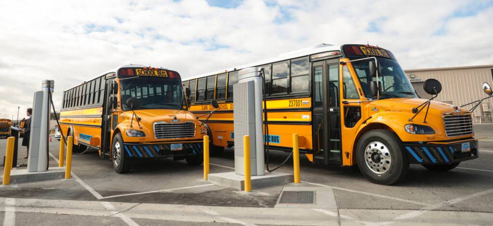 FILE - Clark County School District officials unveil the school district's first electric schoo ...