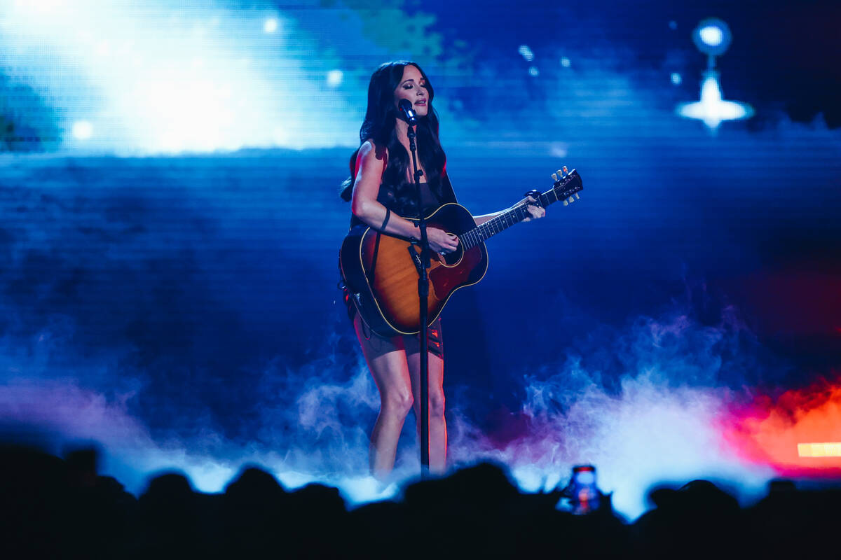 Kacey Musgraves performs during her Deeper Well tour stop at T-Mobile Arena on Saturday, Sept. ...