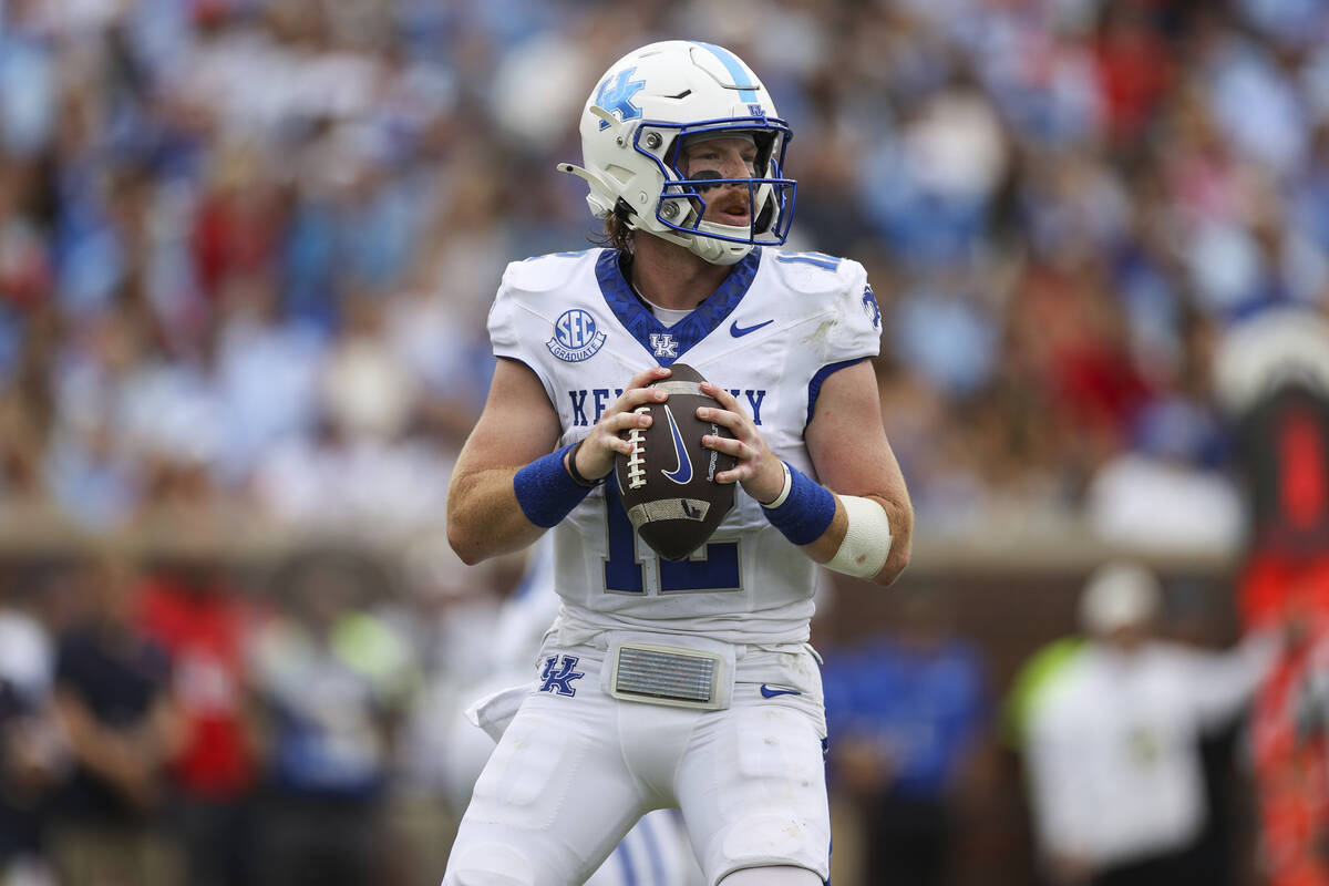 Kentucky quarterback Brock Vandagriff (12) looks to throw the ball during the first half of an ...