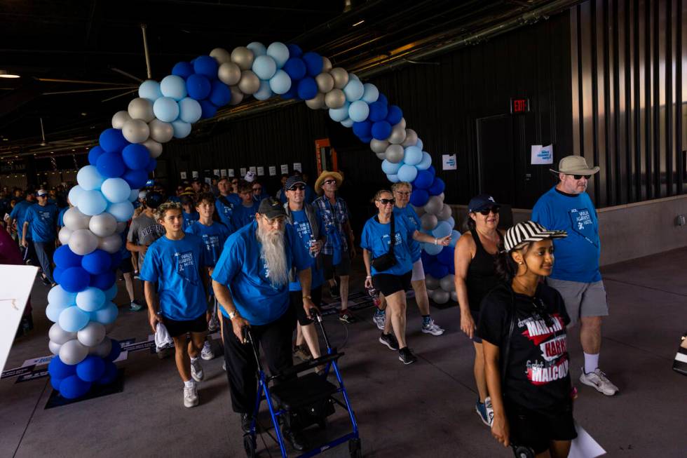 People participate in the Anti-Defamation League's Walk Against Hate at Las Vegas Ballpark in D ...