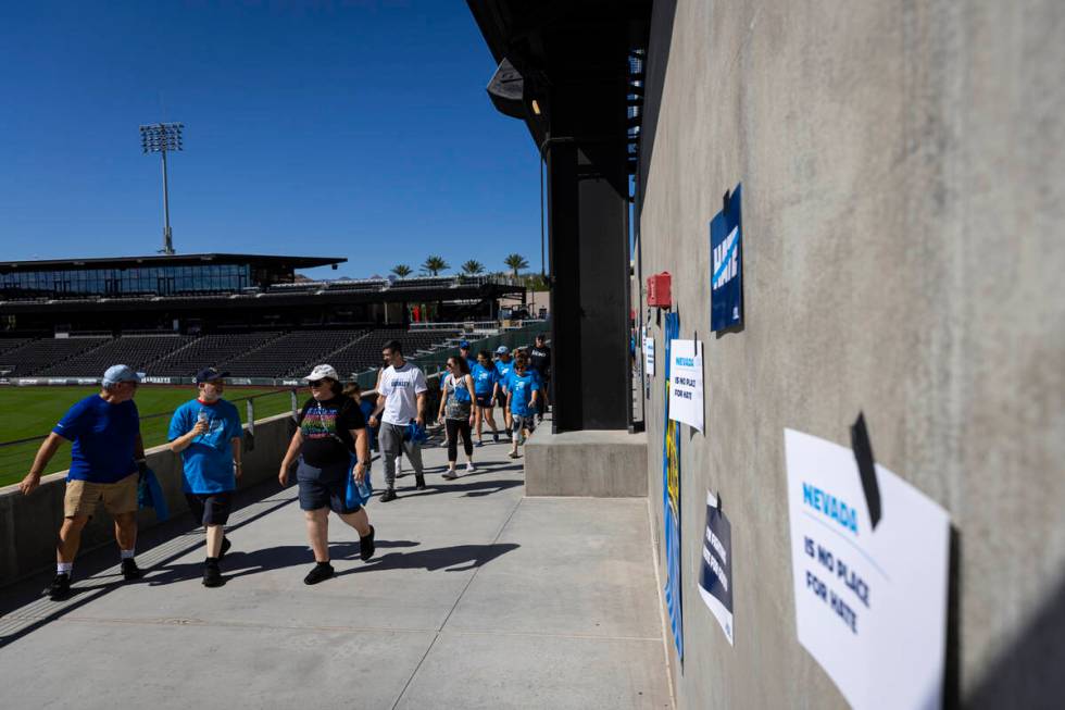 People participate in the Anti-Defamation League's Walk Against Hate at Las Vegas Ballpark in D ...