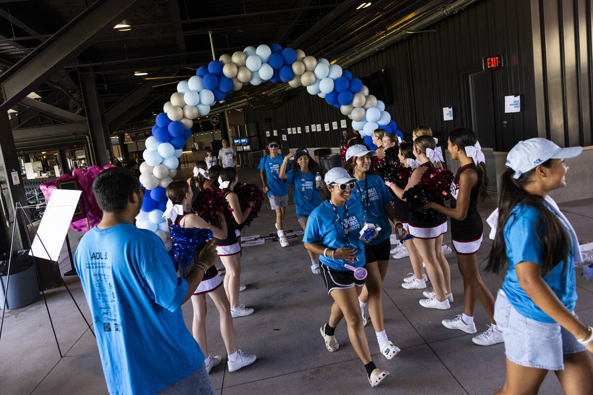 People participate in the Anti-Defamation League's Walk Against Hate at Las Vegas Ballpark in D ...