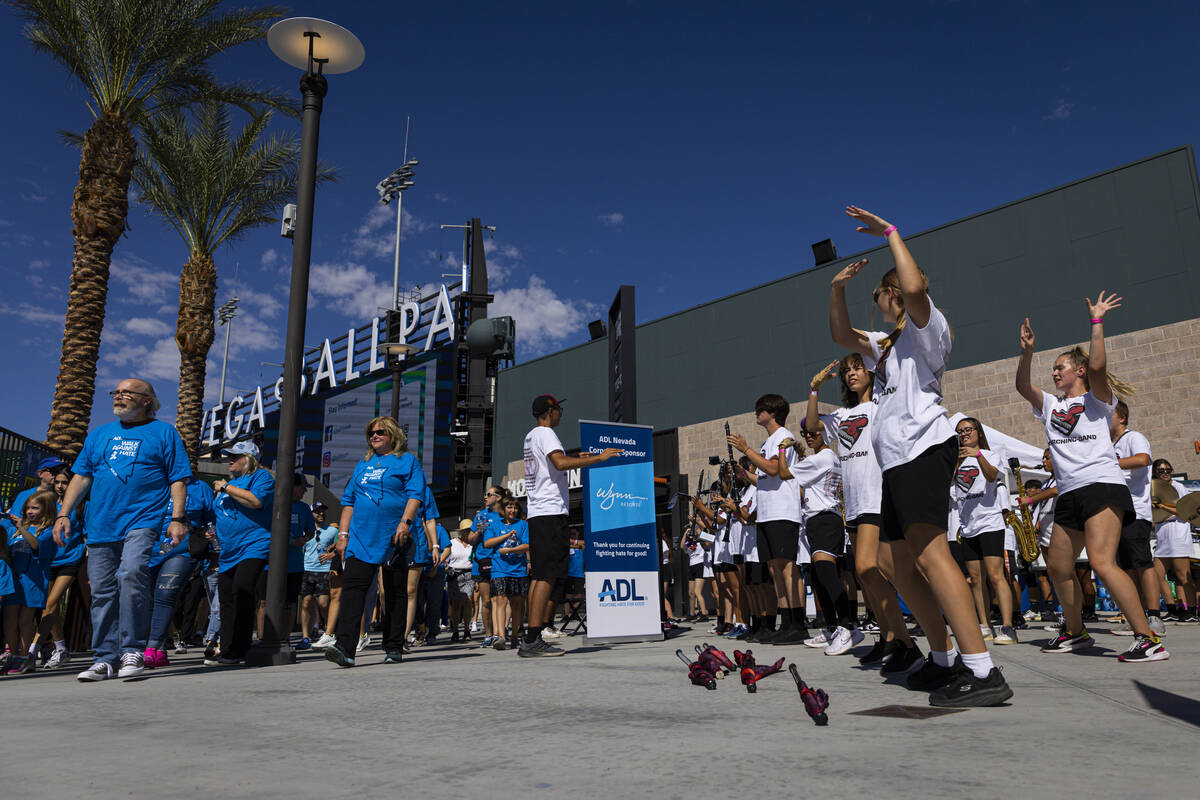 Desert Oasis High School marching band members entertain attendees during the Anti-Defamation L ...