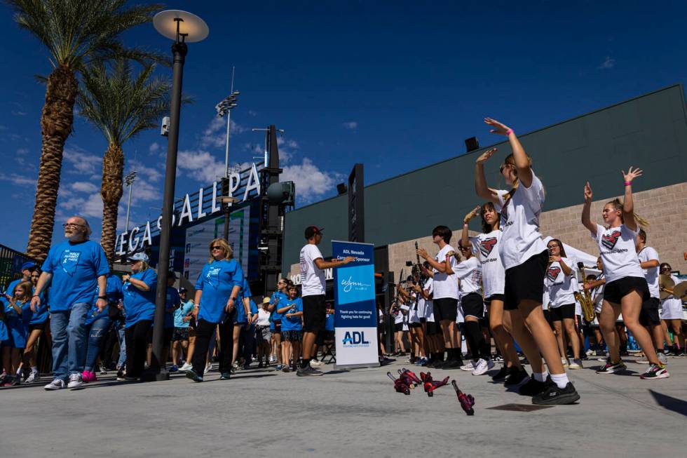 Desert Oasis High School marching band members entertain attendees during the Anti-Defamation L ...