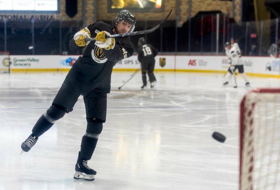 Golden Knights right wing Jonas Rondbjerg (46) takes a shot on goal during the first day of tra ...