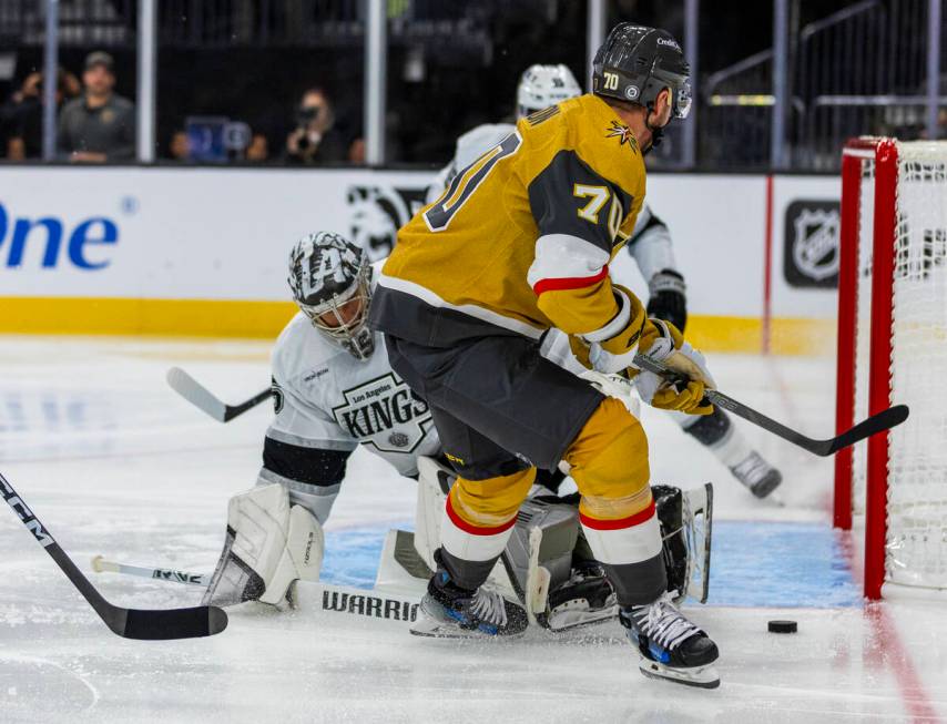 Golden Knights forward Tanner Pearson (70) attempts to sneak a goal past Los Angeles Kings goal ...