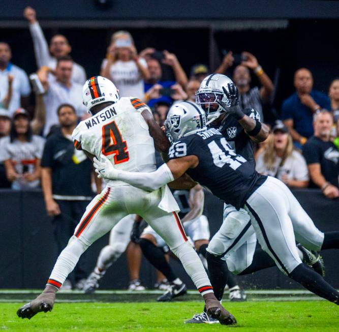 Cleveland Browns quarterback Deshaun Watson (4) is sacked late by Raiders defensive end Charles ...