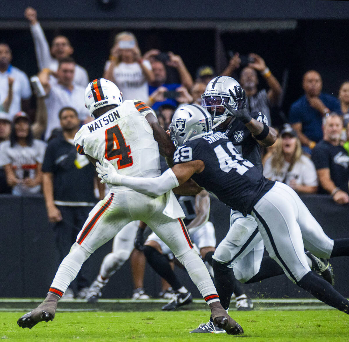 Cleveland Browns quarterback Deshaun Watson (4) is sacked late by Raiders defensive end Charles ...