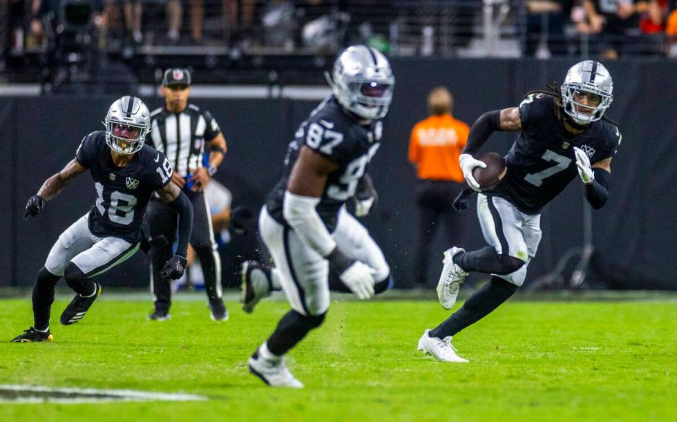 Raiders safety Tre'von Moehrig (7) runs after an interception against the Cleveland Browns duri ...