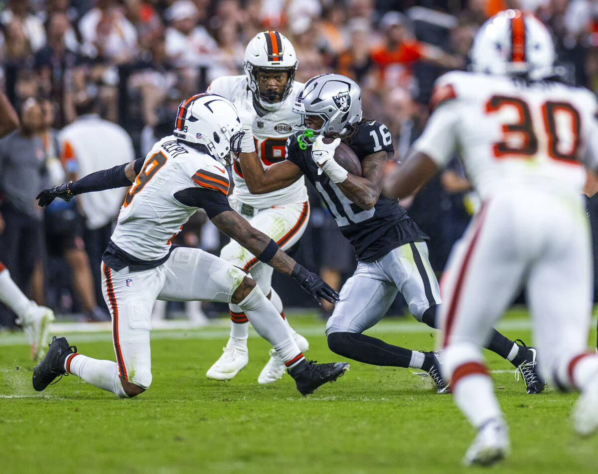 Raiders wide receiver Jakobi Meyers (16) cuts up field past Cleveland Browns safety Grant Delpi ...