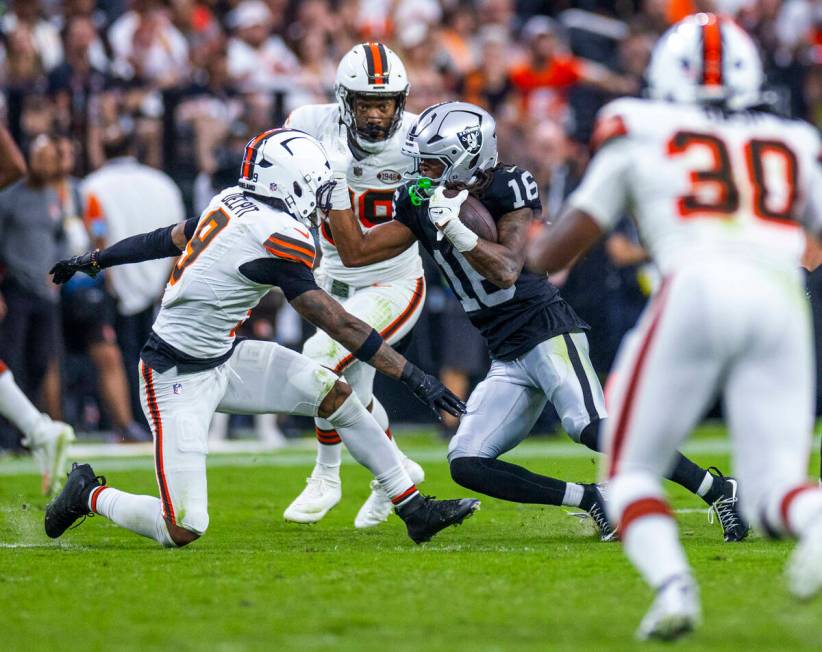 Raiders wide receiver Jakobi Meyers (16) cuts up field past Cleveland Browns safety Grant Delpi ...