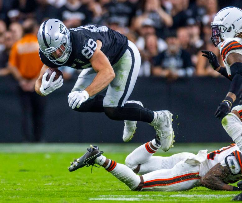 Raiders tight end Brock Bowers (89) is upended on a tackle by the Cleveland Browns during the s ...