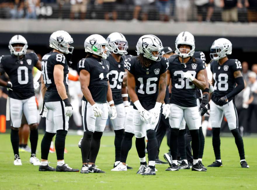 Raiders players prepare to warms up before an NFL game against the Cleveland Browns at Allegian ...