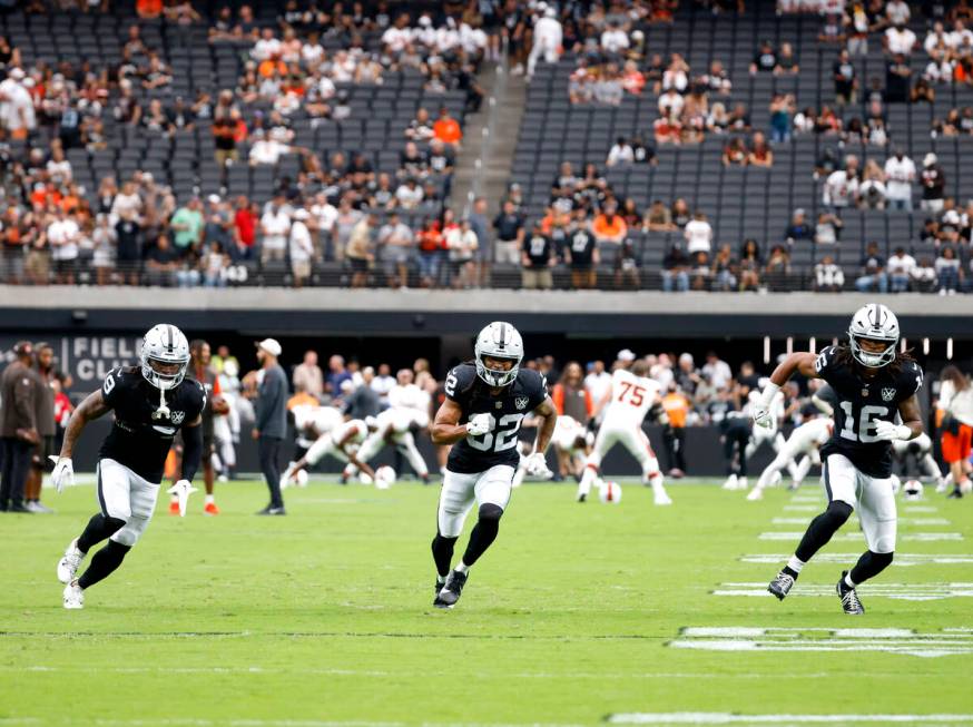 Raiders wide receiver DJ Turner (19), wide receiver Tyreik McAllister (32) and wide receiver Ja ...