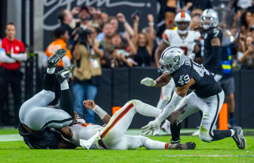 Cleveland Browns quarterback Deshaun Watson (4) is sacked late by Raiders defensive end Charles ...