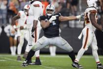 Raiders defensive tackle Christian Wilkins (94) signals for the Raiders to get the football aft ...