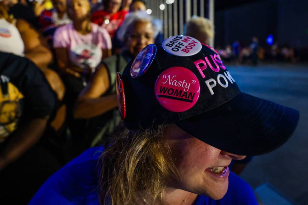 Melanie Klinghoffer wears buttons on a hat during a campaign event for Democratic presidential ...