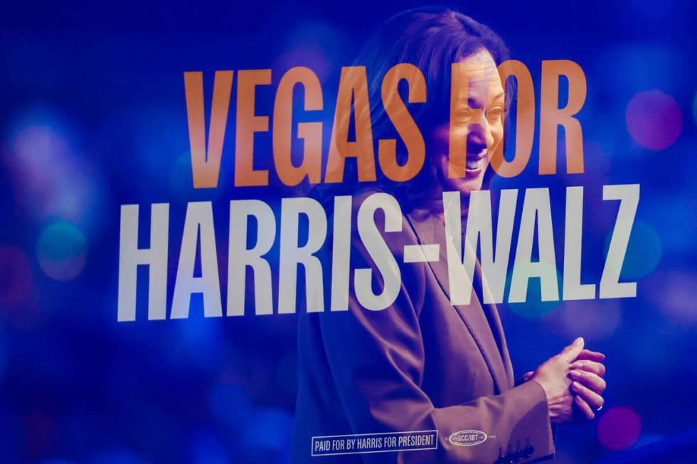 In a double exposure photo, Democratic presidential nominee Vice President Kamala Harris is see ...