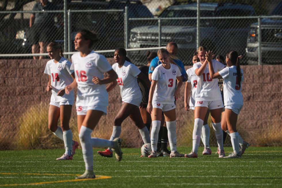 Coronado's Ryan Neel (10) celebrates her goal with teammates during a soccer game at Faith Luth ...