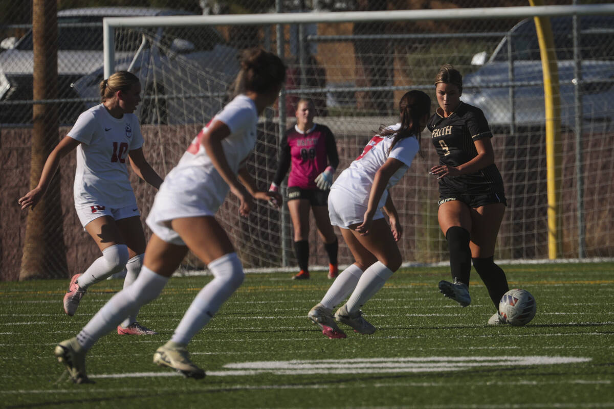 Faith Lutheran's Leila Armstrong (9) kicks the ball against Coronado during a soccer game at Fa ...