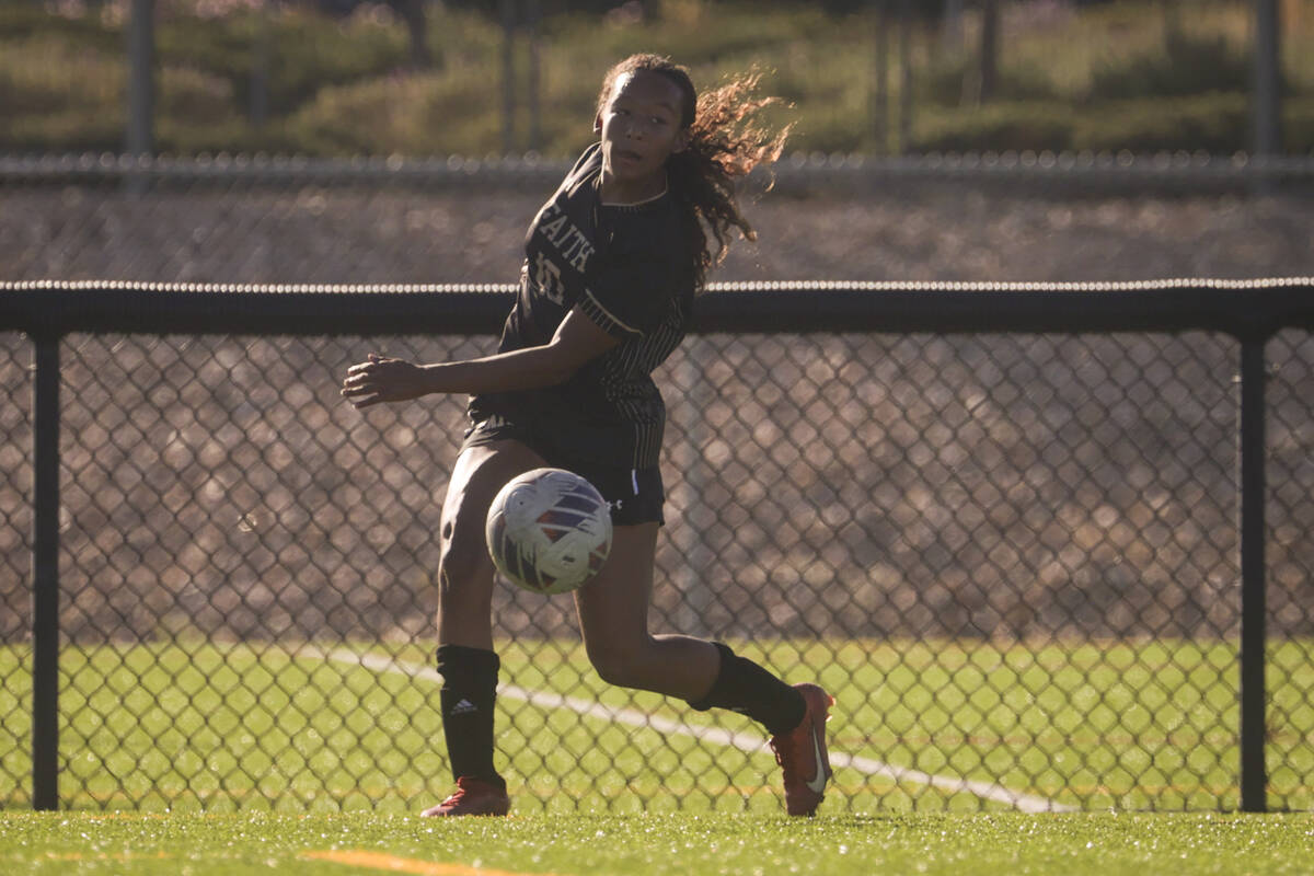 Faith Lutheran's Briana Lee (10) passes the ball against Coronado during a soccer game at Faith ...