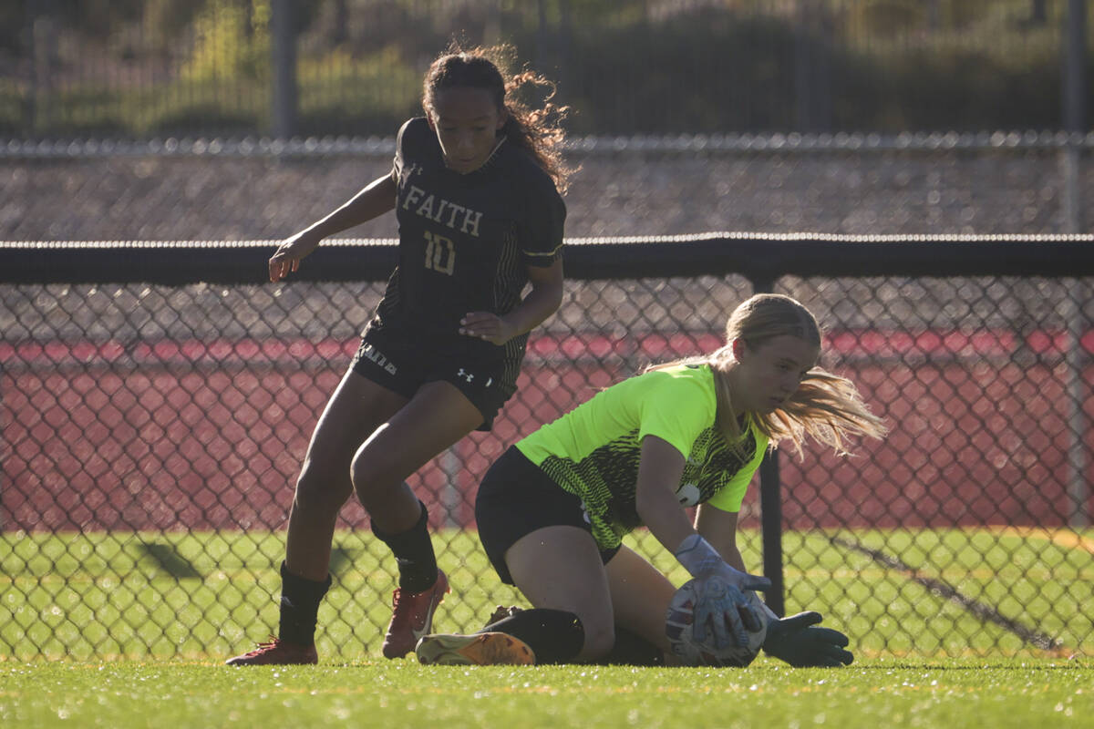 Coronado's goalkeeper Liliana Foss (0) stops the ball in front of Faith Lutheran's Briana Lee ( ...