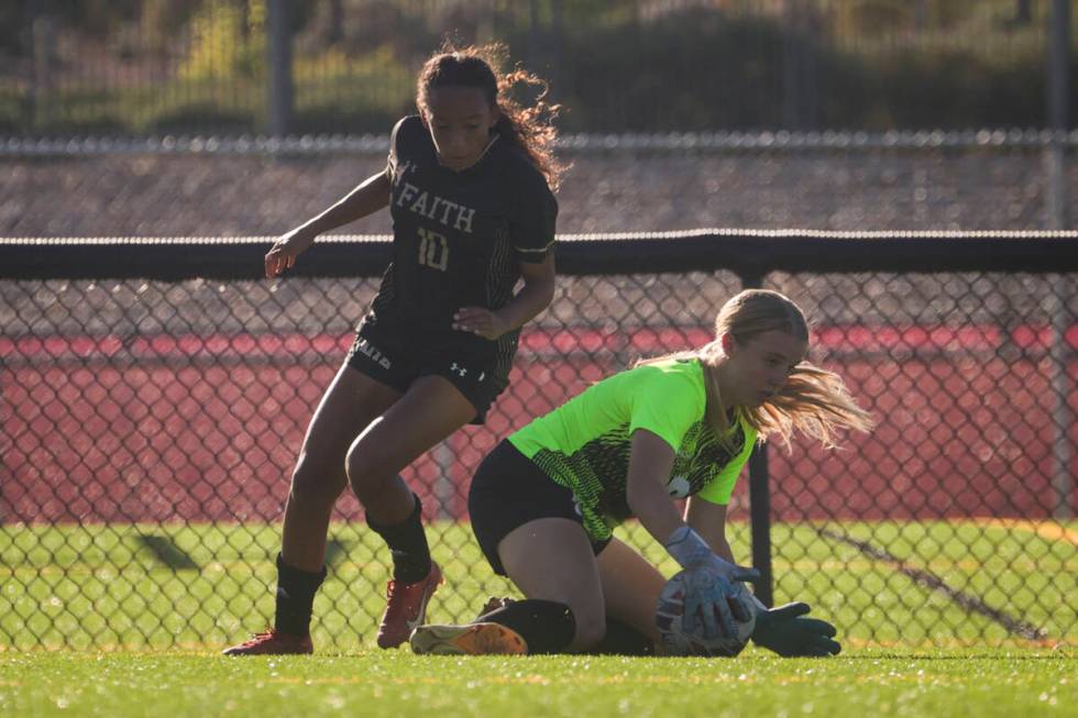 Coronado's goalkeeper Liliana Foss (0) stops the ball in front of Faith Lutheran's Briana Lee ( ...