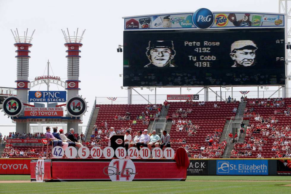 A video board displays video from former Cincinnati Reds player Pete Rose's record-setting 4,19 ...