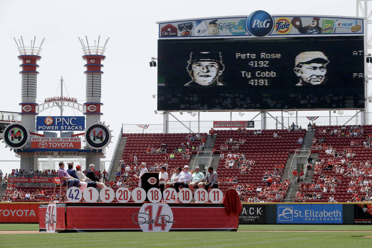 A video board displays video from former Cincinnati Reds player Pete Rose's record-setting 4,19 ...