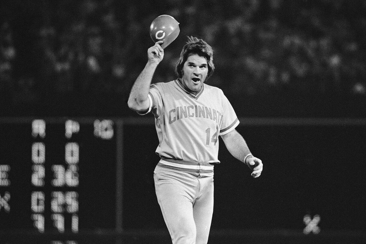 FILE - In this July 31, 1978 file photo, Cincinnati Reds third baseman Pete Rose tips his cap t ...