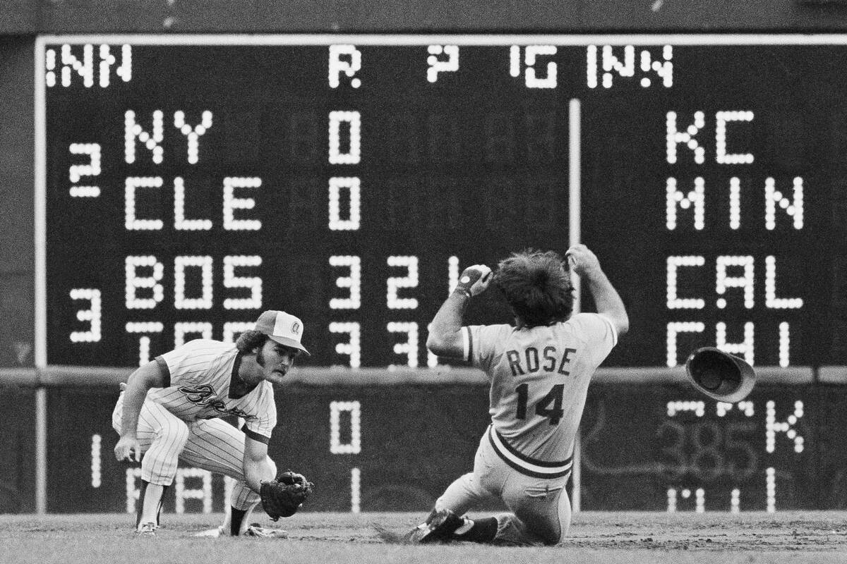 Cincinnati Reds Pete Rose attempts a steal at second base during the third inning against the ...