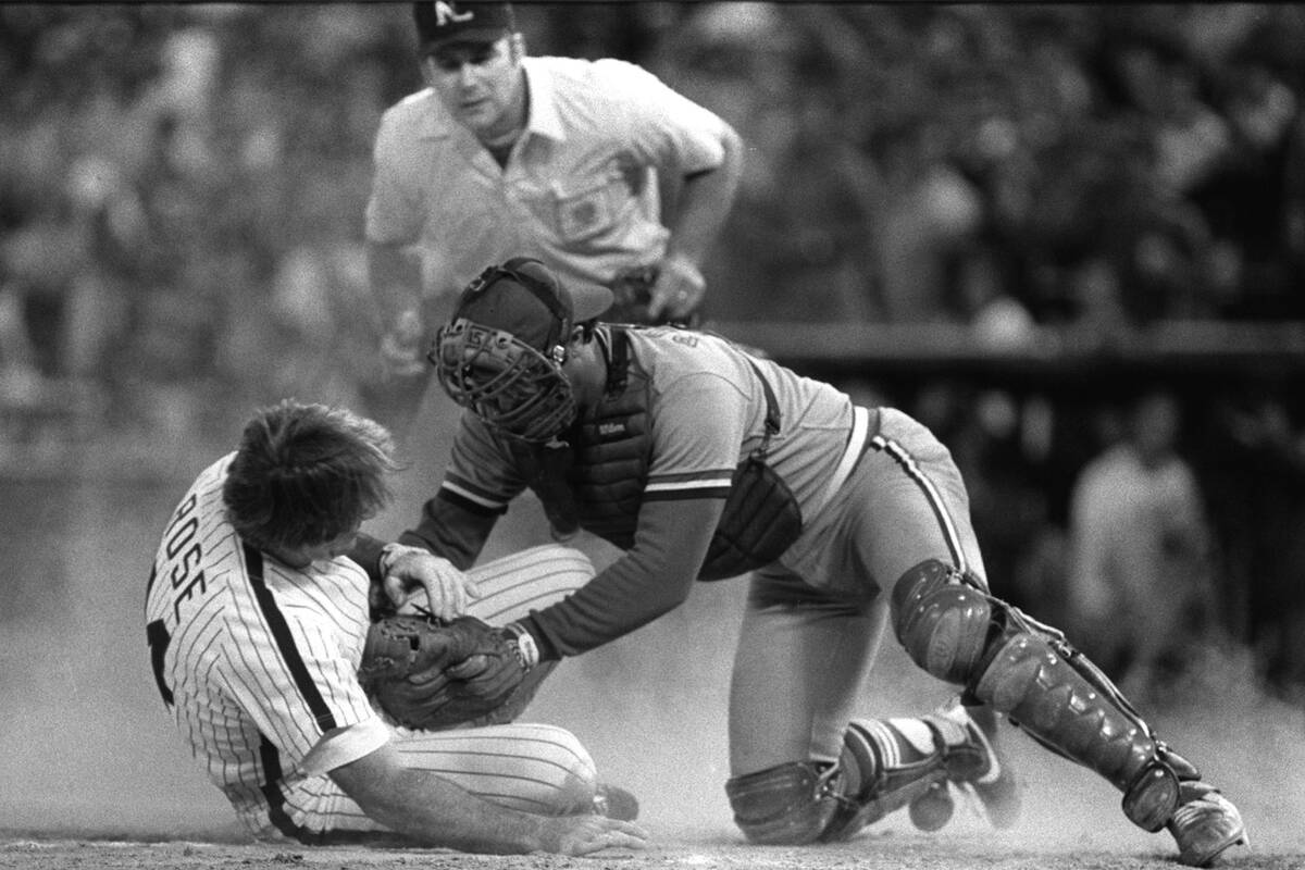 ** FILE ** Former St. Louis Cardinals' catcher Darrell Porter tags out Philadelphia Phillies' P ...