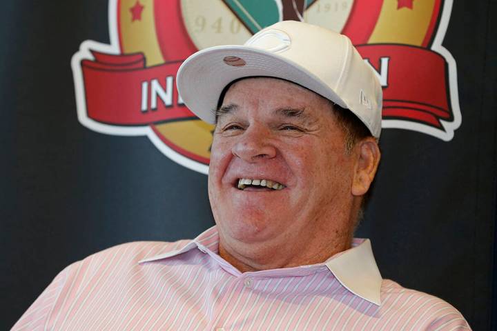 Former Cincinnati Reds player and manager Pete Rose, laughs during a press conference, where it ...