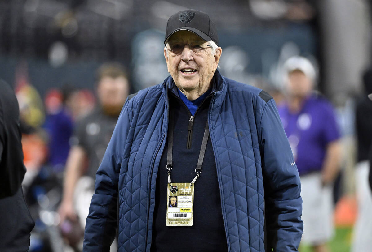 Brent Musburger walks on the field before the Las Vegas Bowl NCAA college football game between ...