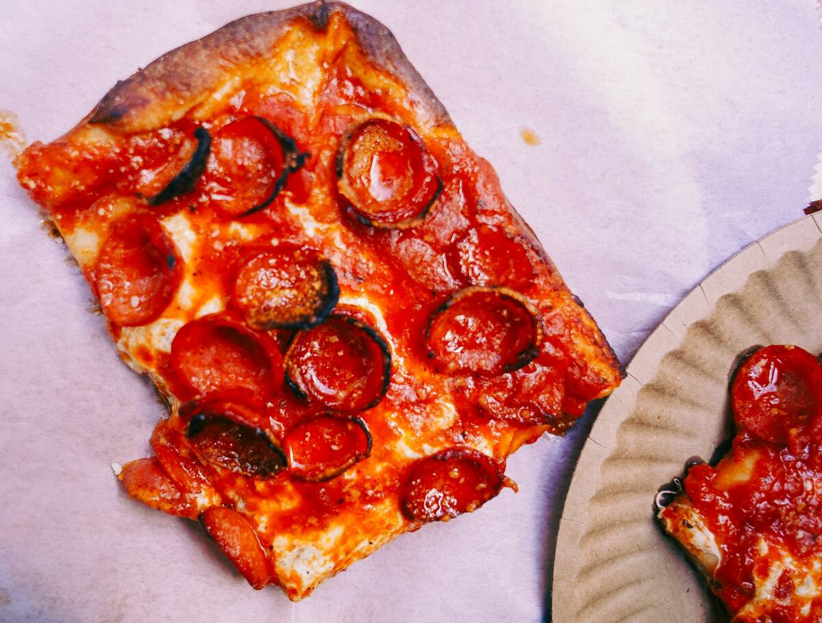 A Sicilian pepperoni slice from Prince Street Pizza in Eat Your Heart Out food hall at Durango ...