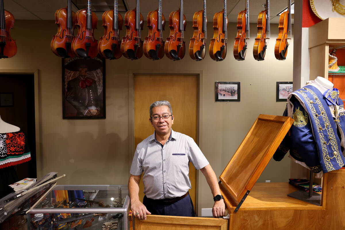 Juan Soto, co-owner of Mariachi Depot, poses at his store at Boulevard Mall on Maryland Parkway ...