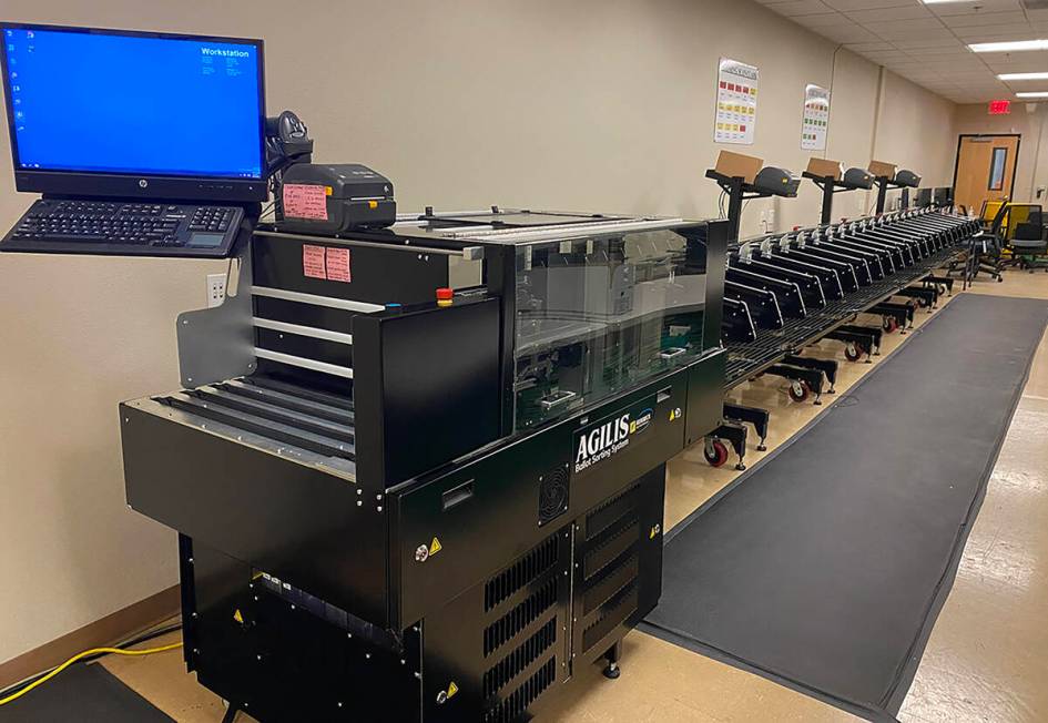 The Clark County Election Department’s Agilis machine — one of the many machines that are p ...