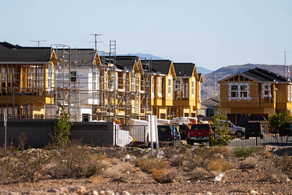 Homes are seen under construction near Wigwam Avenue and Rainbow Boulevard. (Chase Stevens/Las ...