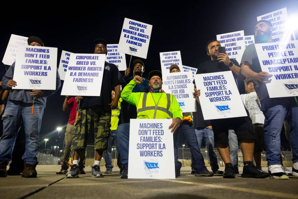 Longshoremen strike at midnight at Bayport Terminal on Tuesday, Oct. 1, 2024, in Houston. (AP P ...