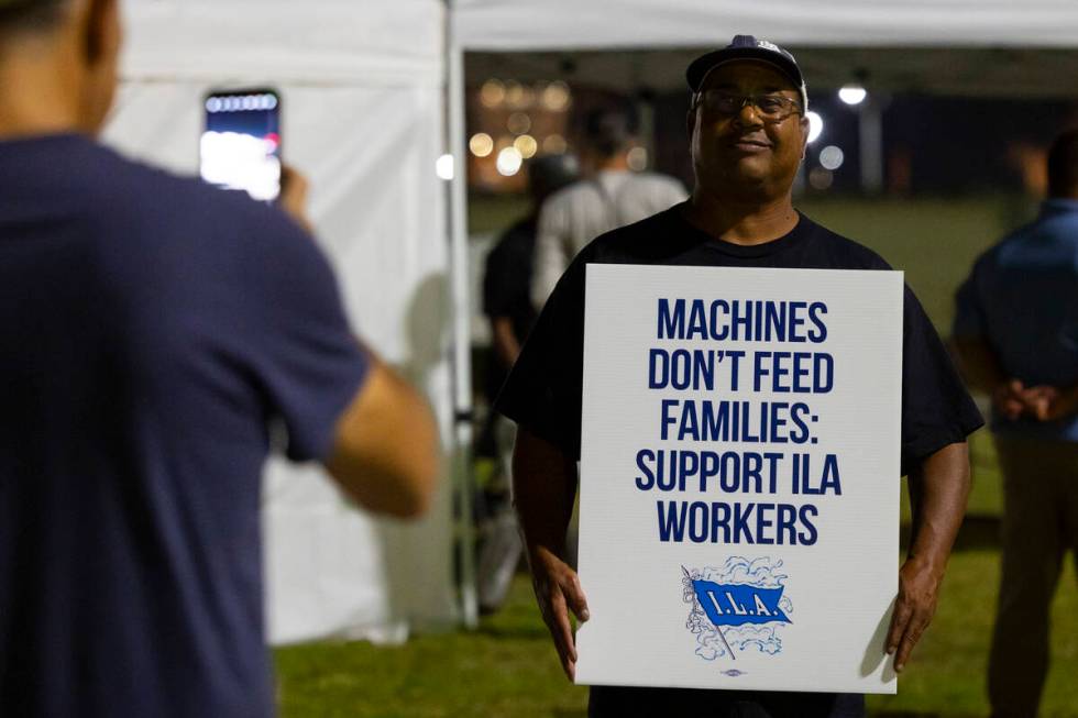 Longshoremen strike at midnight at Bayport Terminal on Tuesday, Oct. 1, 2024, in Houston. (AP P ...