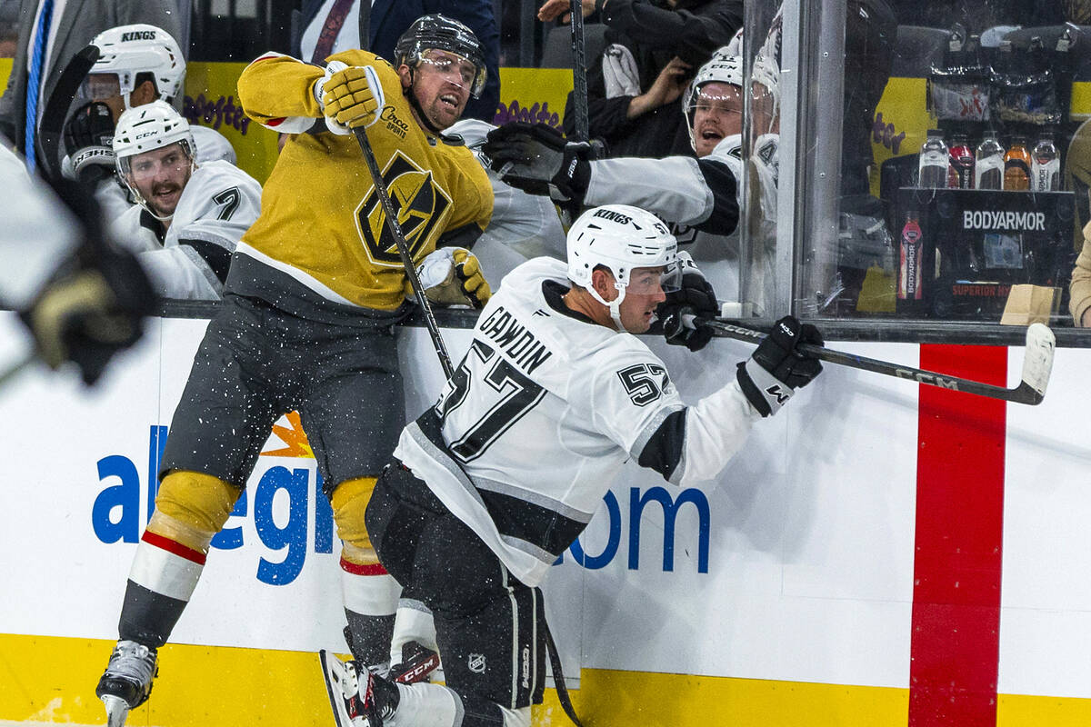 Golden Knights forward Tanner Pearson (70) collides with Los Angeles Kings center Glenn Gawdin ...