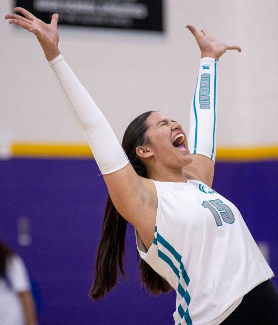 Silverado junior Kalia Roberts (15) celebrates gaining a point during the high school volleybal ...