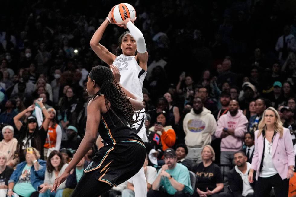 Las Vegas Aces' A'ja Wilson shoots over New York Liberty's Jonquel Jones during the second half ...