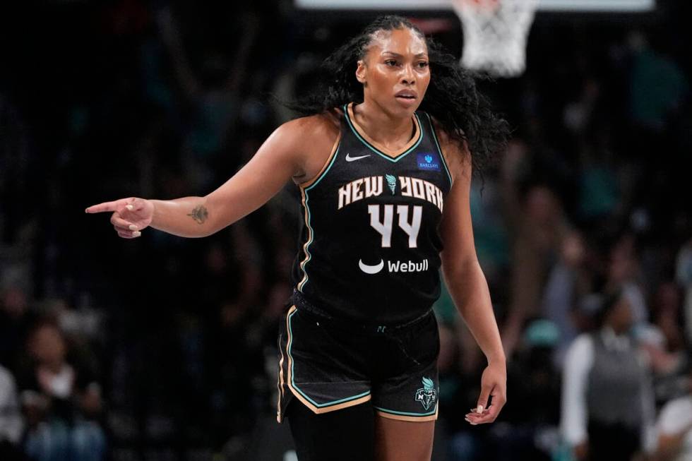 New York Liberty's Betnijah Laney-Hamilton (44) gestures to teammates after making a three-poin ...